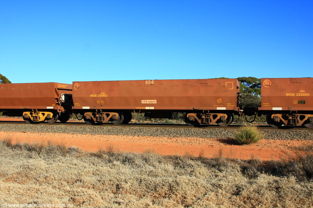 100731 02430
WOE type iron ore waggon WOE 33395 is one of a batch of one hundred and forty one built by United Group Rail WA between November 2005 and April 2006 with serial number 950142-100 and fleet number 894 for Koolyanobbing iron ore operations, on empty train 6418 at Binduli Triangle, 31st July 2010.
Keywords: WOE-type;WOE33395;United-Group-Rail-WA;950142-100;
