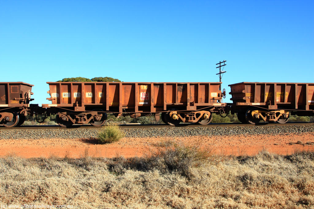 100731 02528
WO type iron ore waggon WO 31214 is one of a batch of sixty two built by Goninan WA between April and August 2000 with serial number 950086-002 and fleet number 110 for Koolyanobbing iron ore operations, and is a Goninan built replacement WO type waggon that replaces the original WAGR built WO type waggon with a WOD type with square features opposed to the curved ones as on the original WO, on empty train 6418 at Binduli Triangle, 31st July 2010.
Keywords: WO-type;WO31214;Goninan-WA;950086-002;