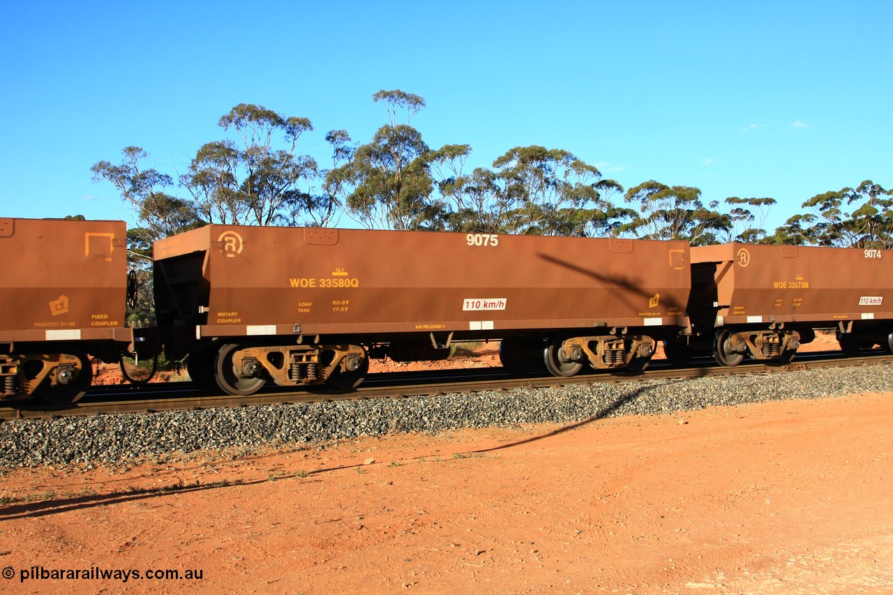 100731 03060
WOE type iron ore waggon WOE 33580 is one of a batch of one hundred and twenty eight built by United Group Rail WA between August 2008 and March 2009 with serial number 950211-120 and fleet number 9075 for Koolyanobbing iron ore operations, empty train arriving at Binduli Triangle, 31st July 2010.
Keywords: WOE-type;WOE33580;United-Group-Rail-WA;950211-120;