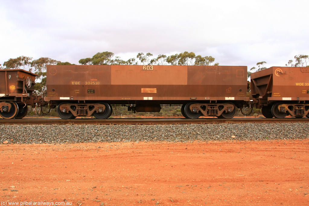 100822 5995
WOE type iron ore waggon WOE 30253 is one of a batch of one hundred and thirty built by Goninan WA between March and August 2001 with serial number 950092-003 and fleet number 603 for Koolyanobbing iron ore operations of Portman Mining, Binduli Triangle 22nd August 2010.
Keywords: WOE-type;WOE30253;Goninan-WA;950092-003;