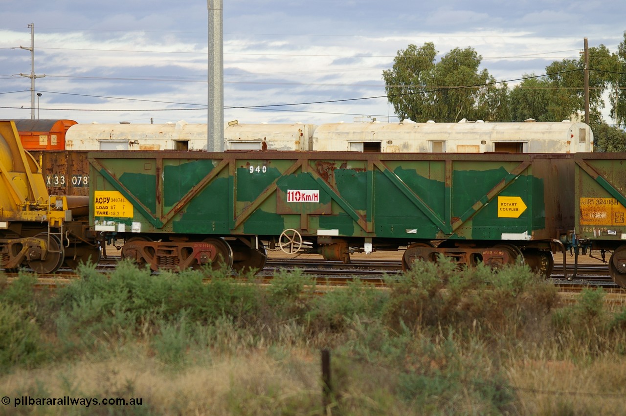 PD 12866
West Kalgoorlie, AOPY 34074 with fleet number 940, one of seventy ex ANR coal waggons rebuilt from AOKF type by Bluebird Engineering SA in service with ARG on Koolyanobbing iron ore trains. They used to be three metres longer and originally built by Metropolitan Cammell Britain as GB type in 1952-55, seen here in a rake with sister waggons.
Keywords: Peter-D-Image;AOPY-type;AOPY34074;Bluebird-Engineering-SA;Metropolitan-Cammell-Britain;GB-type;