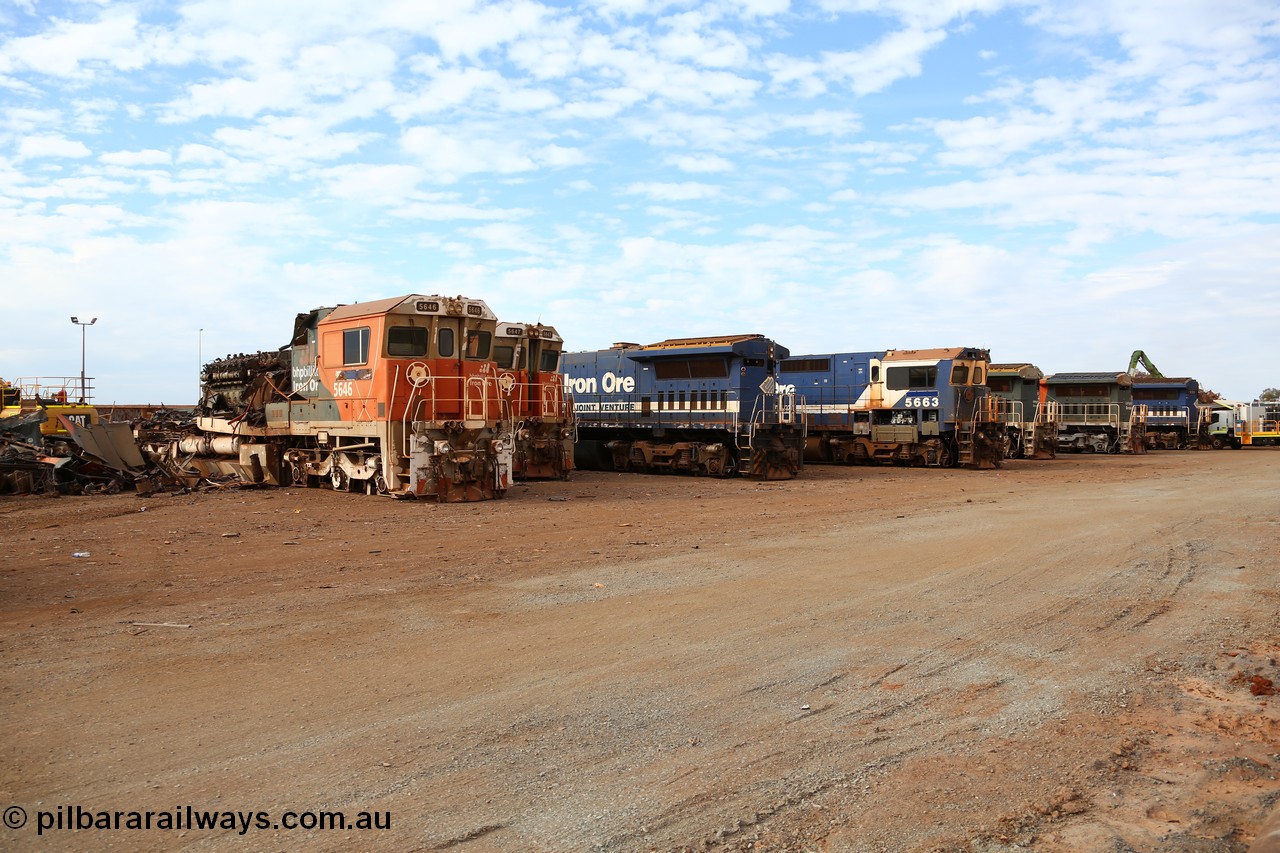 150522 8162
Wedgefield, Sims Metal yard, the first batch of BHP Billiton Dash 8 locos to be scrapped, 5646 serial 8244-11/92-135 one of a pair of new Goninan WA built CM40-8 units has already had most of the hood removed and the V16 7FDL prime mover is visible. To right are units 5647, 5657, 5656, 5663, 5635, 5645, 5649, 5638, 5640 and 5659.
Keywords: 5646;Goninan;GE;CM40-8;8244-11/92-135;