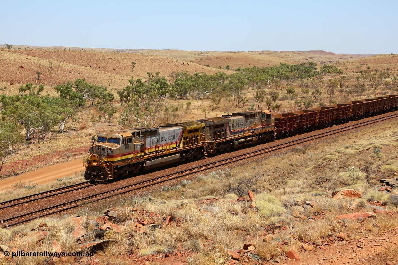 151111 9580
An empty train is still struggling upgrade at the 98 km post on the Tom Price line behind double General Electric Dash 9-44CW units 9403 serial 53457 wearing ROBE Pilbara Rail livery and 7087 serial 47766 wearing the original Hamersley Iron livery.
Keywords: 9403;GE;Dash-9-44CW;53457;