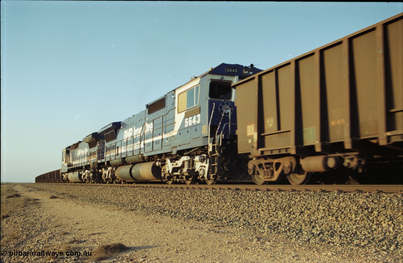 203-15
Bing Siding, a loaded BHP Iron Ore train with double Dash 8 power behind Goninan rebuilds to GE CM40-8M models 5660 'Kure' serial 8412-05 / 94-151 and sister 5643 'Mt Whaleback' serial no 8281-08 / 92-132 as run along the mainline past an empty train.
Keywords: 5643;Goninan;GE;CM40-8M;8281-08/92-132;rebuild;AE-Goodwin;ALCo;M636C;5470;G6047-2;