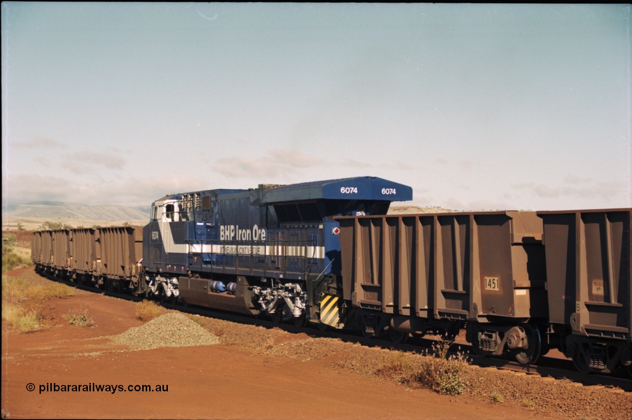 207-06
BHP General Electric built AC6000 unit 6074 serial 51066, brand new and unnamed at Yandi One load-out loop as a remote mid-train unit.
Keywords: 6074;GE;AC6000;51066;
