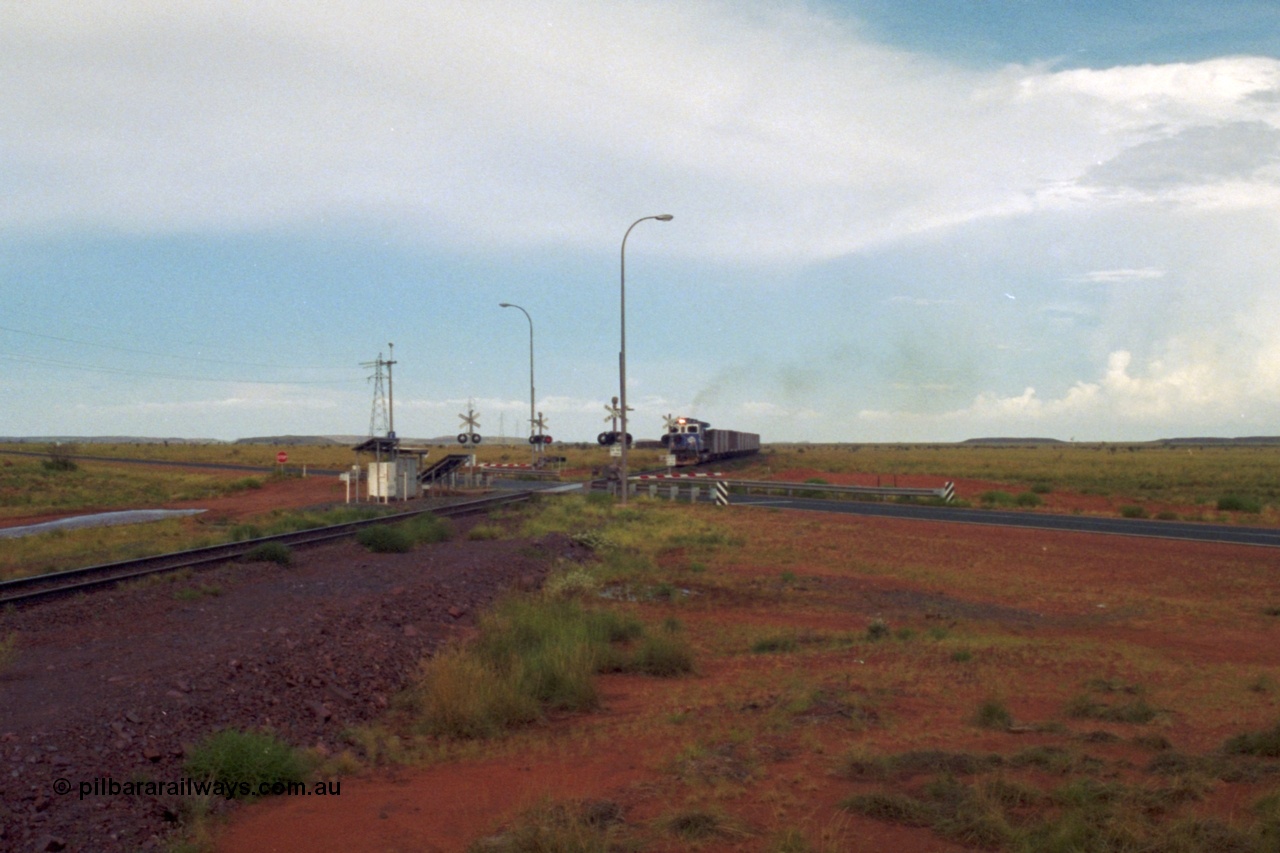 218-22
De Grey, Great Northern Highway grade crossing at the 57.15 km with a loaded train on approach.
Keywords: 5510;Goninan;GE;C36-7M;4839-07/87-075;rebuild;AE-Goodwin;ALCO;C636;5458;G6027-2;