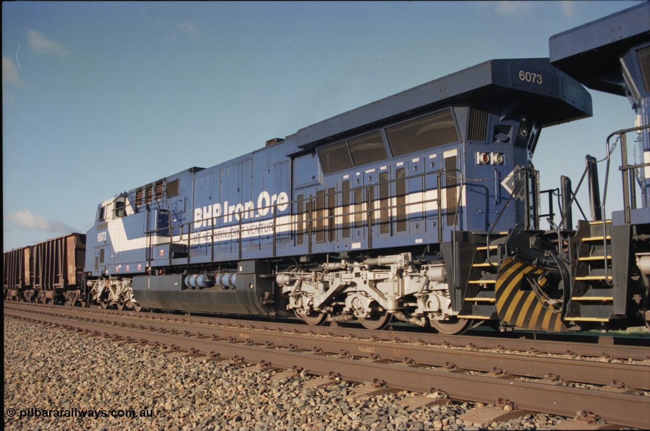 224-14
Bing siding, 6073 'Fortescue' serial 51065 a General Electric AC6000 built by GE at Erie awaits the road to depart south, radiator, steerable bogie and taper in cab side. [url=https://goo.gl/maps/KQrczNpVhAH2]GeoData[/url].
Keywords: 6073;GE;AC6000;51065;