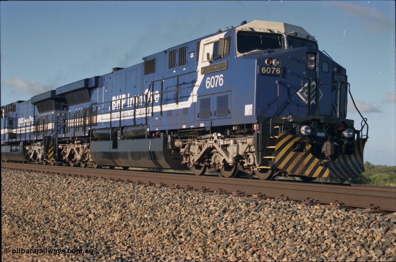 224-16
Bing siding, 6076 'Mt Goldsworthy' serial 51068 a General Electric AC6000 built by GE at Erie awaits the road to depart south. [url=https://goo.gl/maps/KQrczNpVhAH2]GeoData[/url].
Keywords: 6076;GE;AC6000;51068;