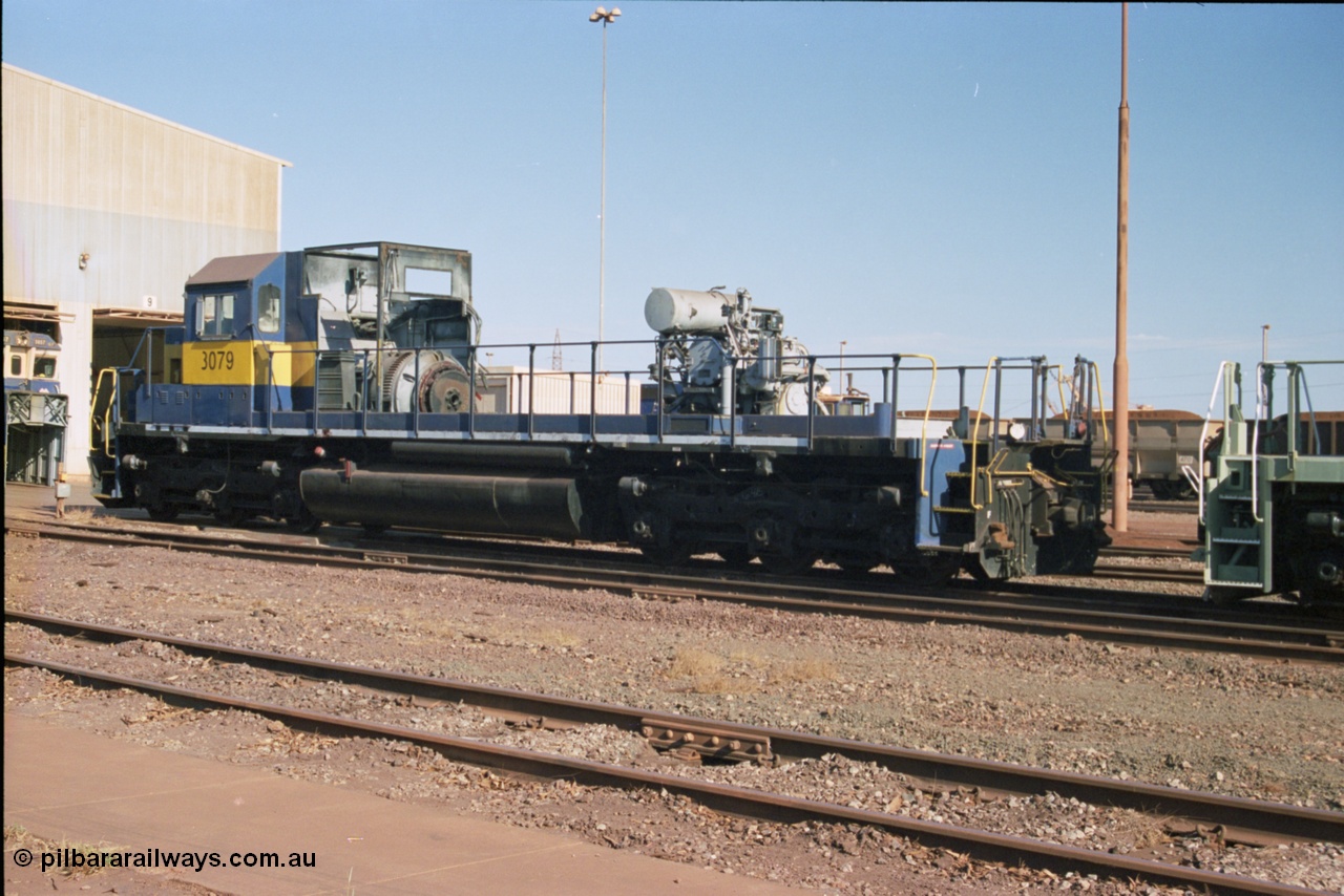 238-18
Nelson Point loco overhaul shop sees former Southern Pacific loco 3079 EMD model SD40, serial number 7861-52 with the long hood removed due to the 645 prime mover failing not long after arrival in Australia. 27th January 2004. [url=https://goo.gl/maps/rqoN9uK26rQ2] Geodata [/url].
Keywords: 3079;EMD;SD40;31542/7861-52;SP8461;