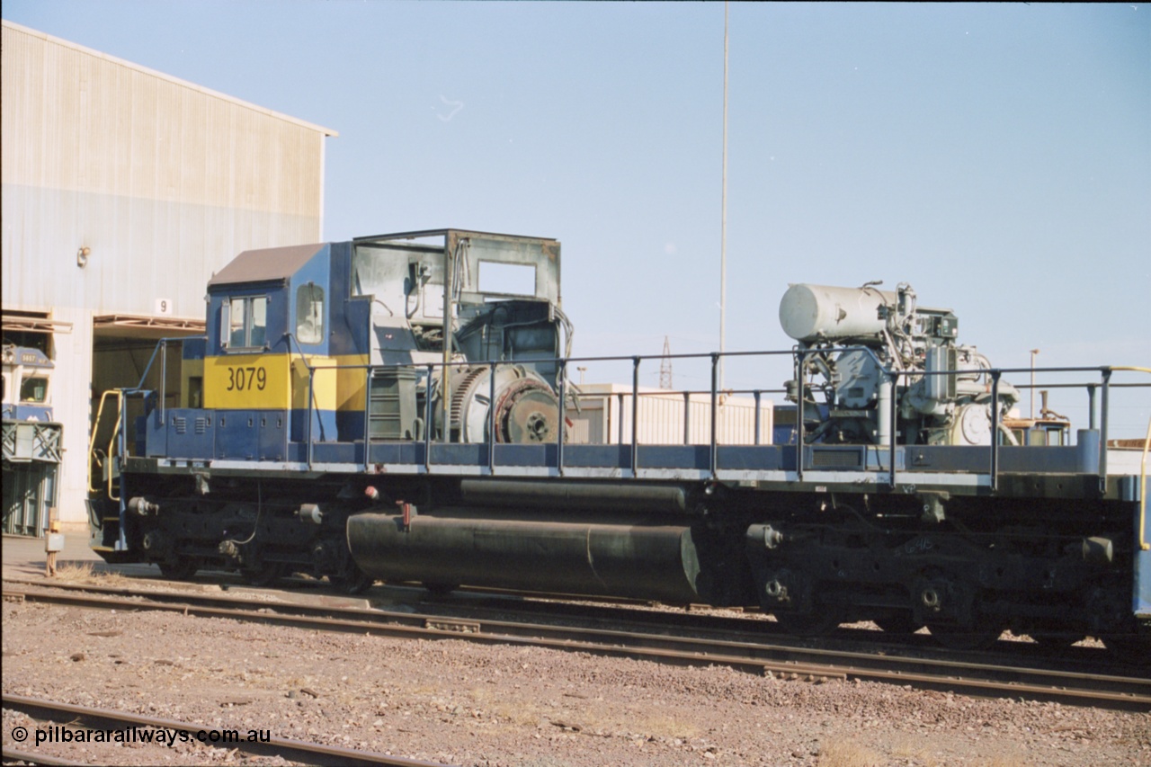 238-19
Nelson Point loco overhaul shop sees former Southern Pacific loco 3079 EMD model SD40, serial number 7861-52 with the long hood removed due to the 645 prime mover failing not long after arrival in Australia. 27th January 2004. [url=https://goo.gl/maps/rqoN9uK26rQ2] Geodata [/url].
Keywords: 3079;EMD;SD40;31542/7861-52;SP8461;