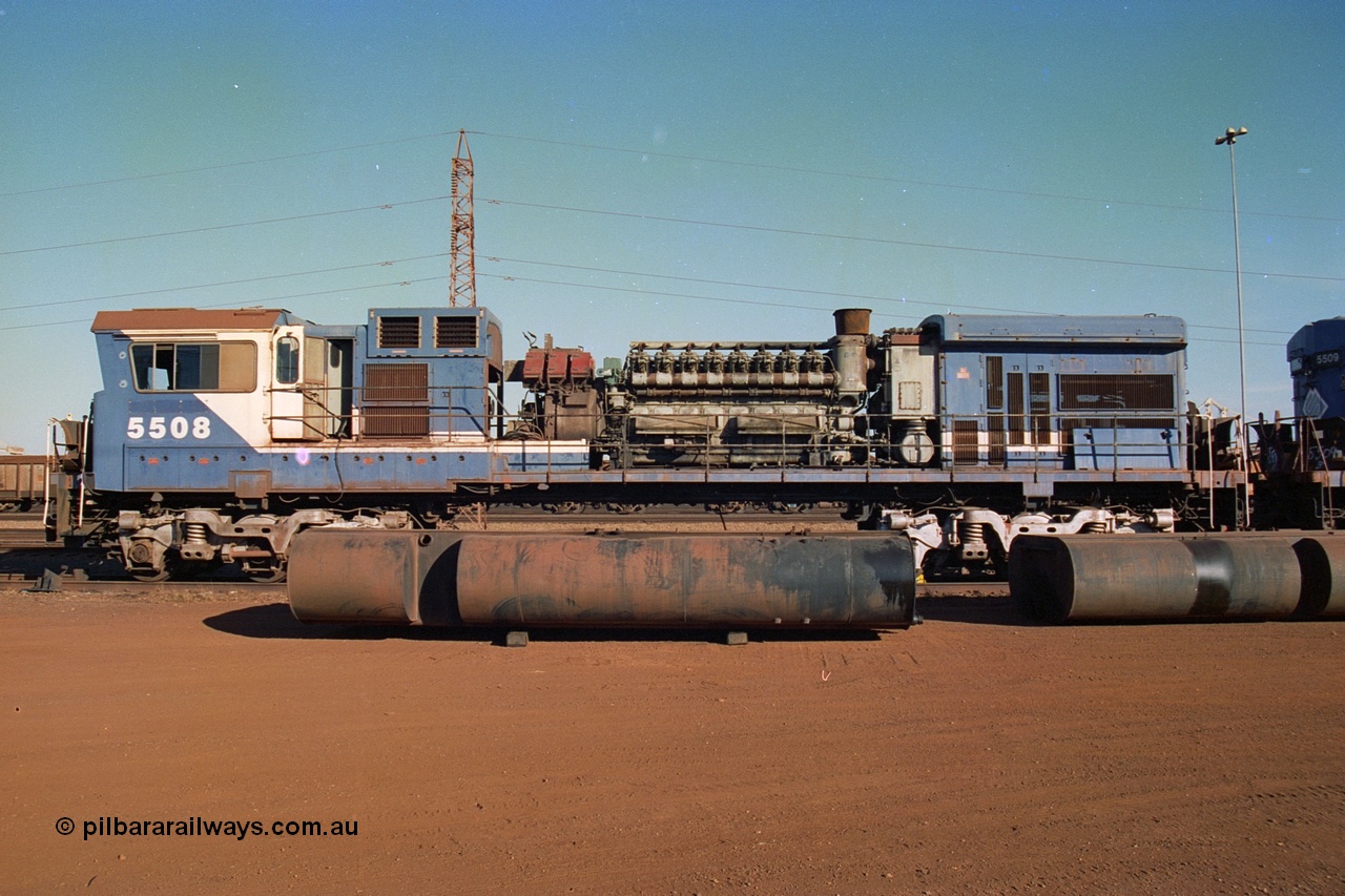 242-06
Nelson Point, BHP Goninan GE rebuild C36-7M unit 5508 serial 4839-04 / 87-073 about to be trucked to United Goninan Perth for eventual overhaul and repainting into the Pilbara Rail livery and leased to Pilbara Rail re-numbered 5052 as a shunt unit at Dampier. May 2002.
Keywords: 5508;Goninan;GE;C36-7M;4839-04/87-073;rebuild;AE-Goodwin;ALCo;C636;5466;G6041-2;