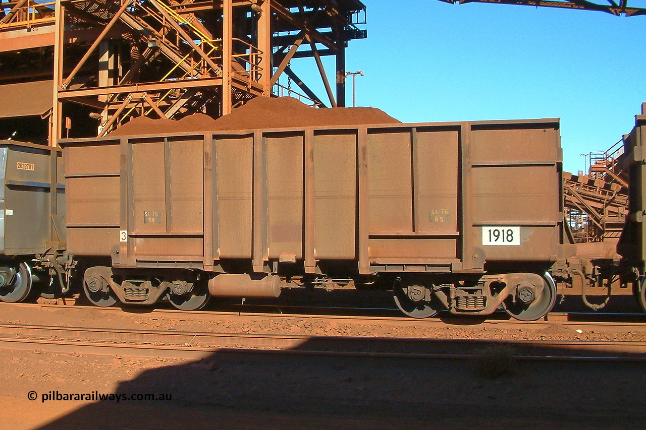 040718 151441
Nelson Point, Car Dumper 3, BHP ore waggon 1918, originally built by Comeng WA in 1975 as part of a batch of one hundred and seventy-five waggons. Seen here with replacement sides out of 3CR12Ti type steel to the then current Goninan style. 18th of July 2004.
Keywords: 1918;Comeng-WA;BHP-ore-waggon;