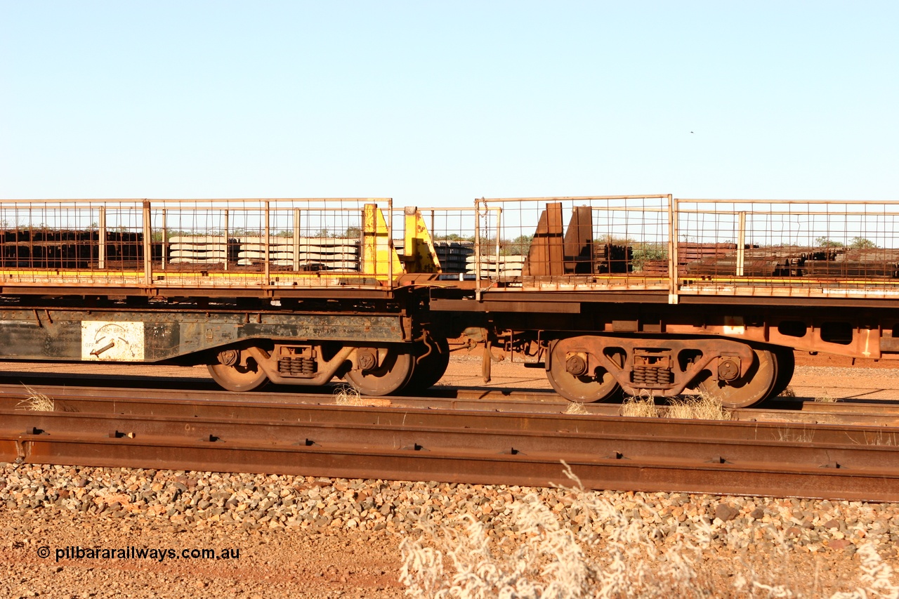 060429 3755
Flash Butt yard, Pony re-laying waggon 6704 special flat waggon on the left coupled to a former Goldsworthy Mining 55 tonnes flat waggon built by Tomlinson Steel from 1966.
Keywords: BHP-pony-waggon;