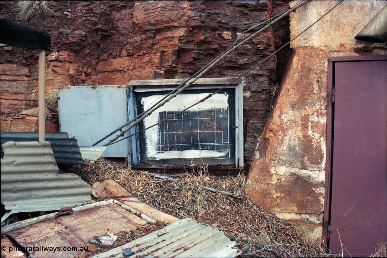194-09
Wittenoom Gorge, Colonial Mine, asbestos mining remains, safety statistics board at mine adit, a view of it in operating condition can be found here [url=http://purl.slwa.wa.gov.au/slwa_b4232624_9]SLWA b4232624 9[/url].
