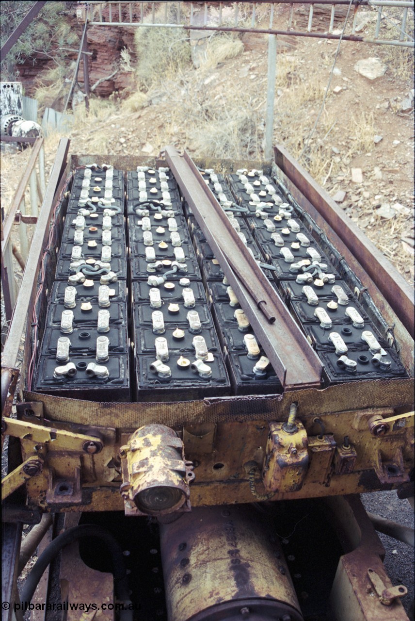 194-22
Wittenoom, Colonial Mine, asbestos mining remains, detail view of a Mancha battery module with the covers in the open position shows the full forty eight 2 volt cells to power the 80 volt locomotives.
