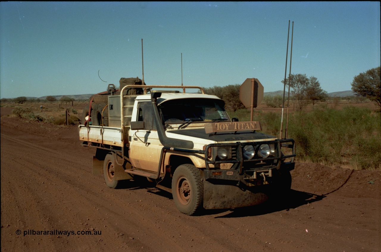 195-01
Munjina, end of Roy Hill Road where it meets the Great Northern Highway, Toyota HJ75 Landcruiser, loaded up to the max, it has a 13 leaf spring pack on the rear, 9 on the front, PTO winch, in route to Wittenoom.
