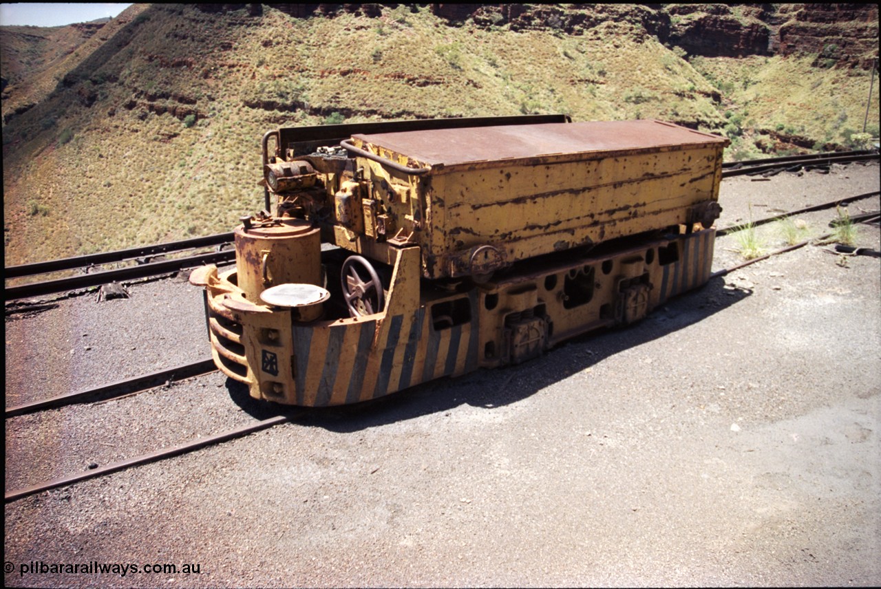 197-18
Wittenoom, Colonial Mine, asbestos mining remains, view of the drivers side of Mancha battery locomotive #4 showing general arrangement.
Keywords: Mancha;