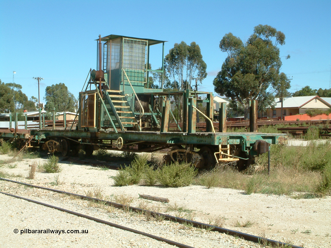 030411 105925
Kimba, rail recovery winch waggon EZWL 2, built using underframe of broad gauge horse box BH 4331. To Eyre Peninsula 1992, recoded then from AZWL. Scrapped in 2005.
Keywords: EZWL-type;EZWL2;SAR-Islington-WS;BH-type;BH4331;