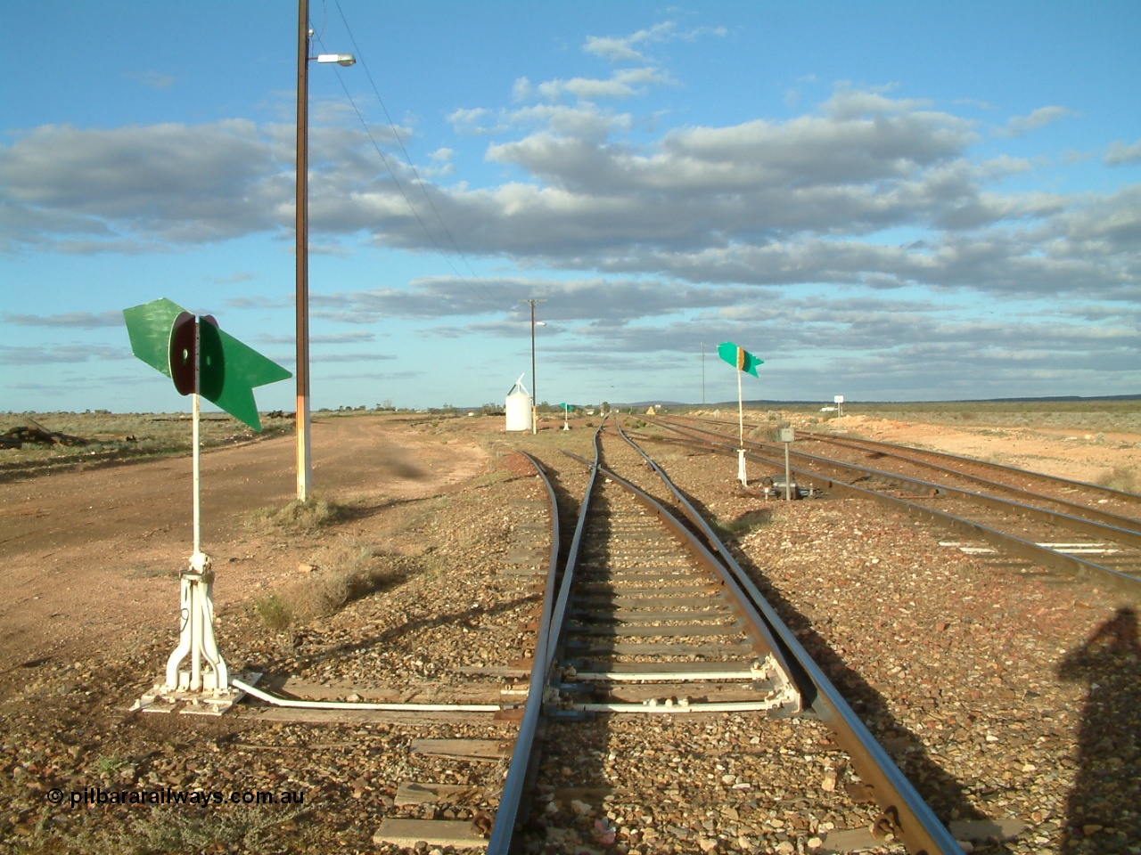 030415 171948
Tarcoola, at the 504.5 km, looking east along the Central Australian Line, Trans Australian is the middle road with the loop on the far right. Tarcoola is the junction for the TAR and CAR railways. [url=https://goo.gl/maps/81W8BzbCjzqJFd1PA]GeoData location[/url]. 15th April 2003.
