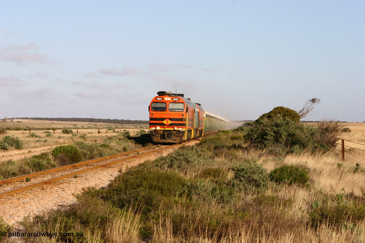 060113 2415
Ceduna, loaded gypsum train 6DD2 powers along the grades outside of town behind the triple 1600 / NJ class combination of 1604, NJ 3 and 1601 at 08:10 AM on the Friday the 13th January 2006.
Keywords: 1600-class;1604;Clyde-Engineering-Granville-NSW;EMD;JL22C;71-731;NJ-class;NJ4;