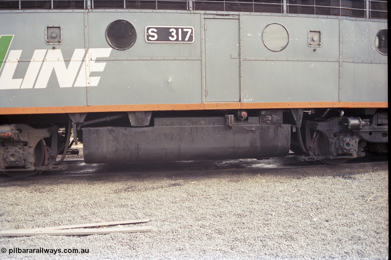 120-08
Seymour loco depot, V/Line broad gauge S class S 317 'Sir John Monash' Clyde Engineering EMD model A7 serial 61-240, fuel tank, sand fillers, number board.
Keywords: S-class;S317;Clyde-Engineering-Granville-NSW;EMD;A7;61-240;bulldog;
