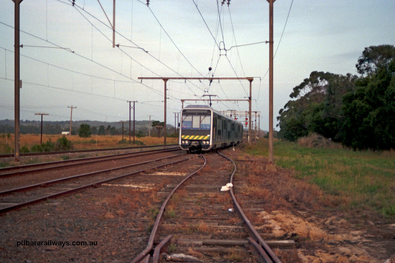 129-1-04
Nar Nar Goon - Tynong section, 4D (Double Deck Development and Demonstration), double deck suburban electric set, testing phase. The set was built by Goninan NSW in December 1991 as a 'Tangara' model.
Keywords: 4D;Double-Deck-Development-Demonstration-train;Goninan-NSW;Tangara;