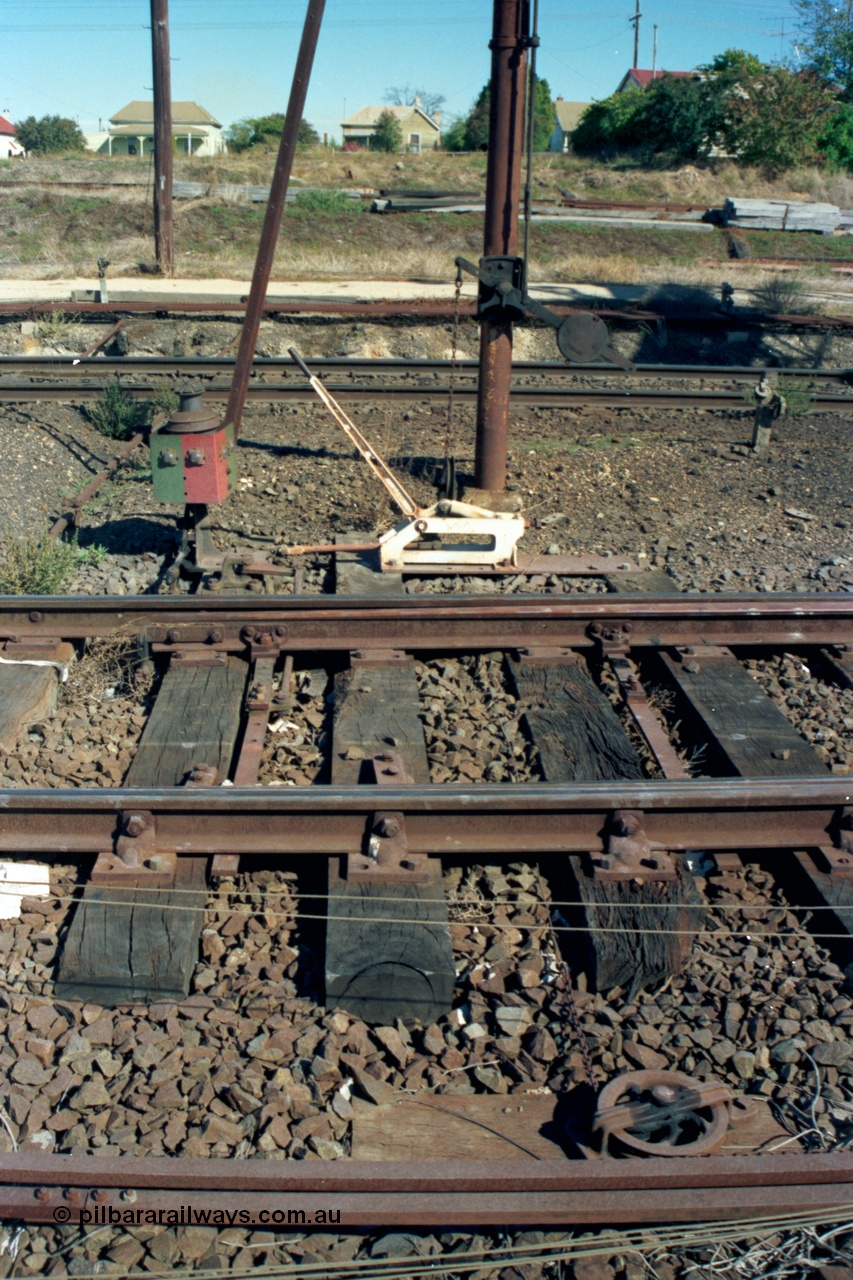 153-2-33
Ararat station yard, track interlocking view, points, lever, indicator, rodding and wire, counter weight on signal post.
