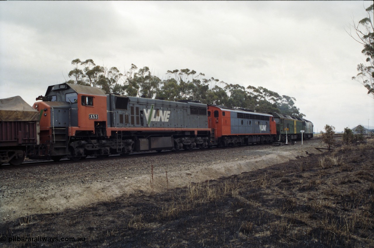 178-07
Lismore, V/Line broad gauge 9169 goods train to Adelaide powers into the loop heading for Ararat with the quad combo of a pair of Australian National BL class locomotives BL 27 Clyde Engineering EMD model JT26C-2SS serial 83-1011 and class leader BL 26 'Bob Hawke' serial 83-1010 and V/Line S class S 313 'Alfred Deakin' Clyde Engineering EMD model A7 serial 61-230 and V/Line X class loco X 53 with serial 75-800 a Clyde Engineering Rosewater SA built EMD model G26C.
Keywords: X-class;X53;Clyde-Engineering-Rosewater-SA;EMD;G26C;75-800;