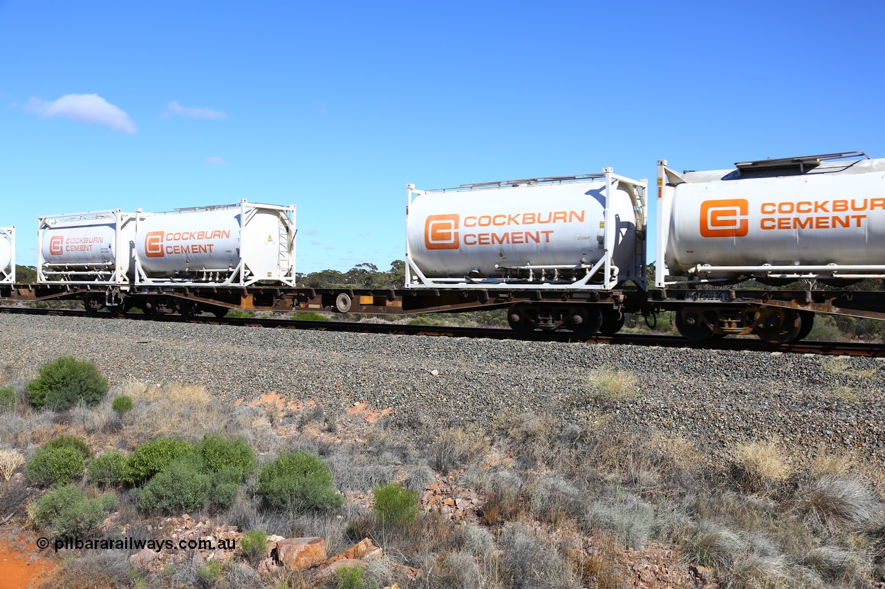 161111 2456
Binduli, Kalgoorlie Freighter train 5025, AQWY 30348 container waggon, originally built by Tomlinson Steel WA as WFX type in 1970 from a batch of one hundred and sixty one waggons, to narrow gauge as QWF type in 1970, back to SG in 1972 as WFX, recoded in 1979 to WQCX type. Loaded with two Cockburn Cement Convair type 20' tanktainers 1109 and 1108.
Keywords: AQWY-type;AQWY30348;Tomlinson-Steel-WA;WFX-type;QWF-type;WQCX-type;