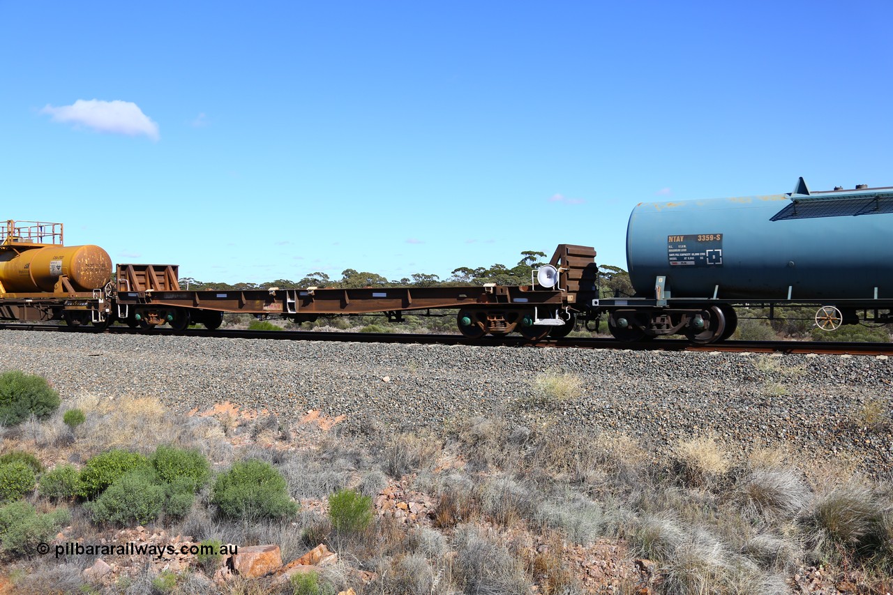161111 2516
Binduli, Kalgoorlie Freighter train 5025, waggon AZDY 30728, one of about fourteen WBAX vans converted to AZDY type sodium cyanide container waggon, originally built by WAGR Midland Workshops as one of seventy five WV/X type covered vans in 1967-68, converted late 1988/9 to WQDF.
Keywords: AZDY-type;AZDY30728;WAGR-Midland-WS;WVX-type;WBAX-type;WQDF-type;WQDY-type;