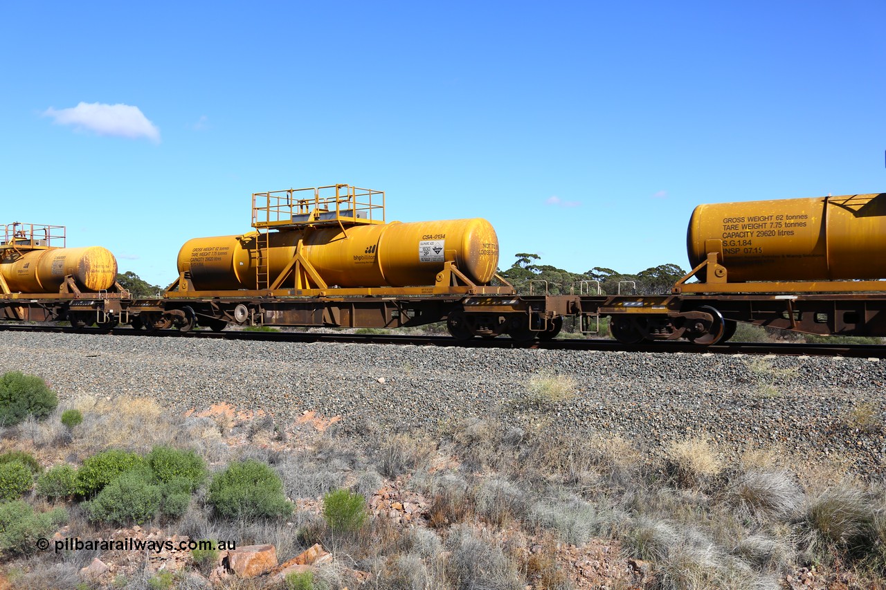 161111 2518
Binduli, Kalgoorlie Freighter train 5025, waggon AQHY 30011 with sulphuric acid tank CSA 0134, originally built by the WAGR Midland Workshops in 1964/66 as a WF type flat waggon, then in 1997, following several recodes and modifications, was one of seventy five waggons converted to the WQH type to carry CSA sulphuric acid tanks between Hampton/Kalgoorlie and Perth/Kwinana.
Keywords: AQHY-type;AQHY30011;WAGR-Midland-WS;WF-type;WFDY-type;WFDF-type;WQH-type;