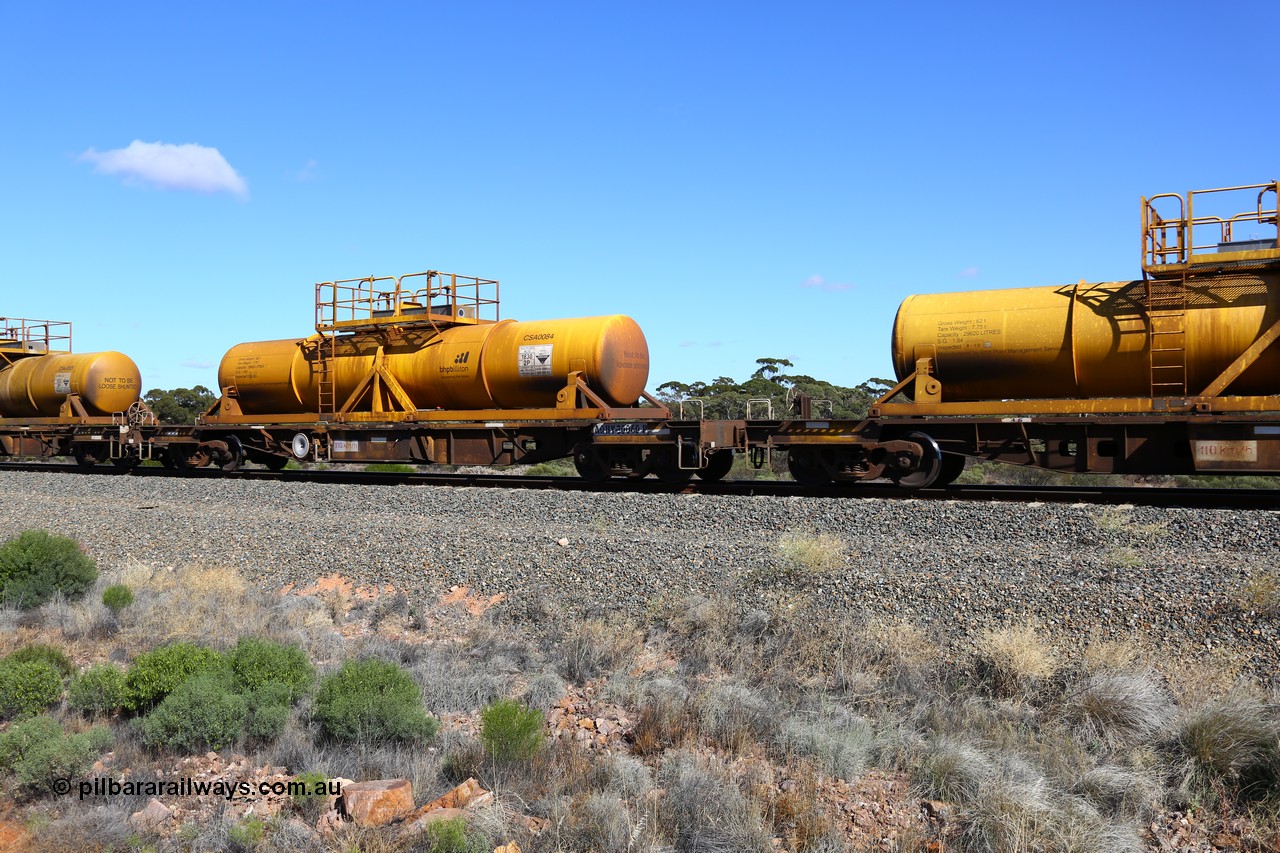 161111 2520
Binduli, Kalgoorlie Freighter train 5025, waggon AQHY 30060 with sulphuric acid tank CSA 0084, originally built by the WAGR Midland Workshops in 1964/66 as a WF type flat waggon, then in 1997, following several recodes and modifications, was one of seventy five waggons converted to the WQH type to carry CSA sulphuric acid tanks between Hampton/Kalgoorlie and Perth/Kwinana.
Keywords: AQHY-type;AQHY30060;WAGR-Midland-WS;WF-type;WFL-type;WFDY-type;WFDF-type;RFDF-type;WQH-type;