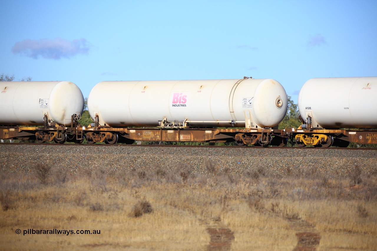 161111 2400
Kalgoorlie, Malcolm freighter train 5029, AZKY type anhydrous ammonia tank waggon AZKY 32237 one of twelve built by Goninan WA in 1998 as type WQK for Murrin Murrin traffic fitted with Bis INDUSTRIES anhydrous ammonia tank A5A.
Keywords: AZKY-type;AZKY32237;Goninan-WA;WQK-type;