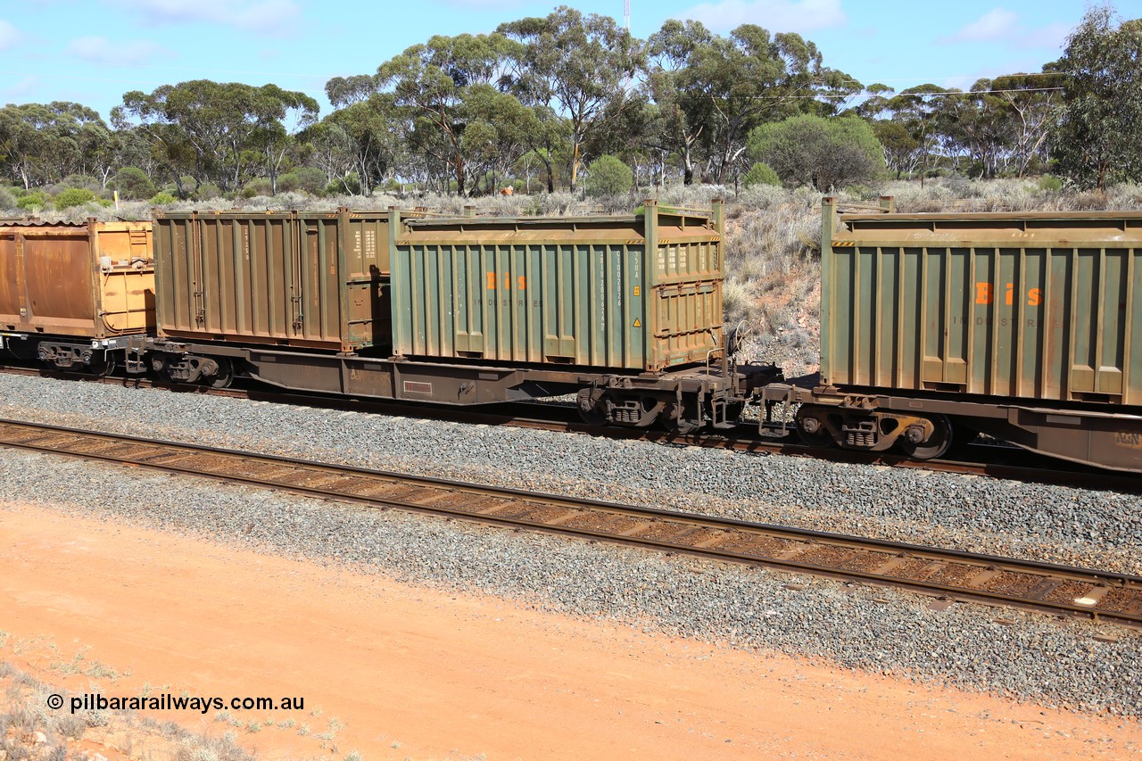 161112 2998
West Kalgoorlie, loaded Malcolm sulphur train 6029, AQNY type waggon AQNY 32175 one of sixty two waggons built by Goninan WA in 1998 as WQN type for Murrin Murrin container traffic with a Bis Industries roll-top type UA55 container SBIU 200626 and an un-decaled hard-top type 25U0 container BISU 100057.
Keywords: AQNY-type;AQNY32175;Goninan-WA;WQN-type;