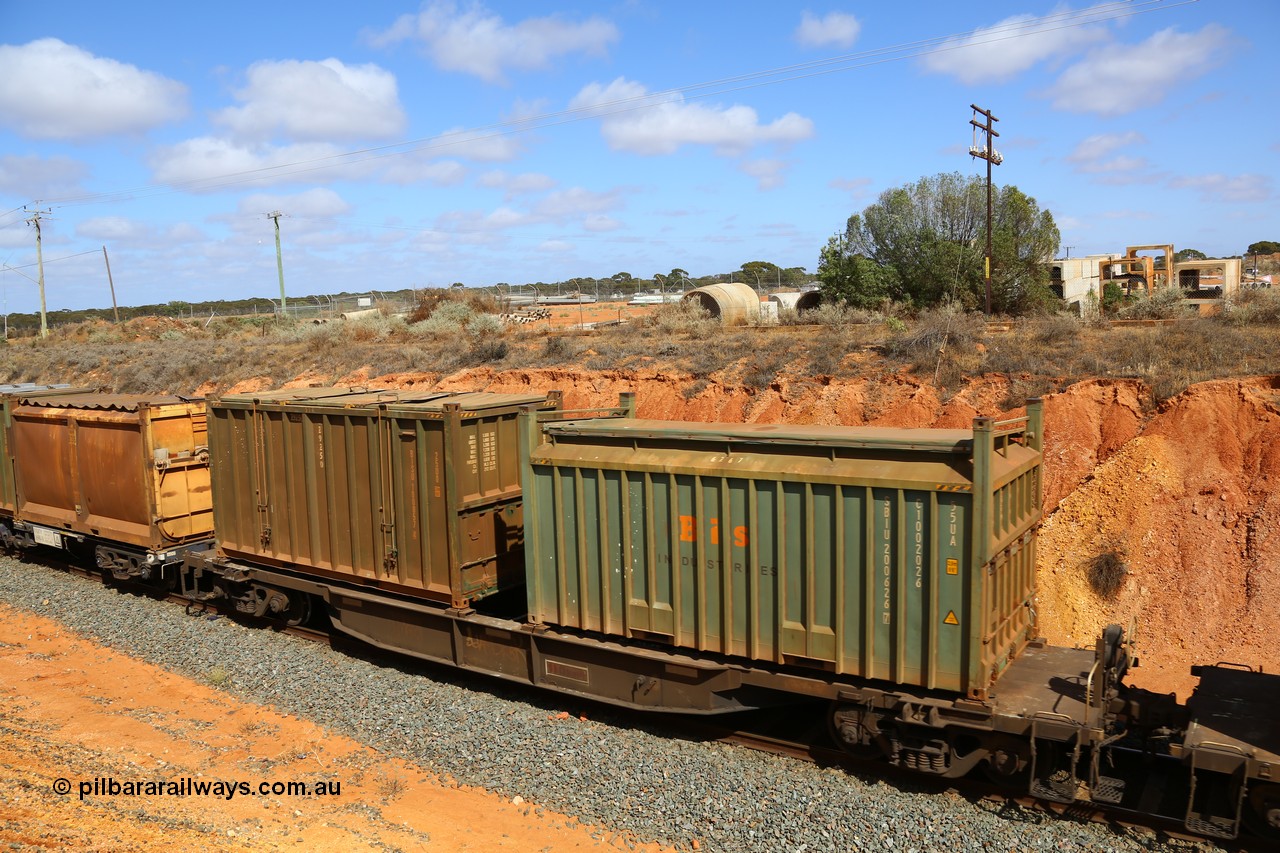 161112 3031
West Kalgoorlie, loaded Malcolm sulphur train 6029, AQNY type waggon AQNY 32175 one of sixty two waggons built by Goninan WA in 1998 as WQN type for Murrin Murrin container traffic with a Bis Industries roll-top type UA55 container SBIU 200626 and an un-decaled hard-top type 25U0 container BISU 100057.
Keywords: AQNY-type;AQNY32175;Goninan-WA;WQN-type;