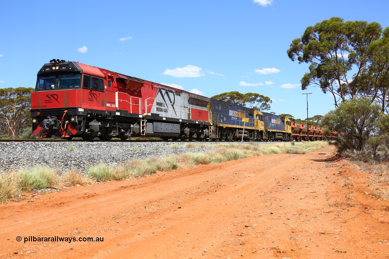 190107 0528
Binduli, following a crew change Mineral Resources empty iron ore train 2034 with Mineral Resources MRL class loco MRL 003 'Southern Cross' with serial R-0113-03/14-506 a UGL Rail Broadmeadow NSW built GE model C44ACi model leads two Pacific National NR class units NR 43 and NR 78 with 53 pairs of MHPYs and 2 single MHLY bottom discharge hopper waggons for 1293 metres and 2258 tonnes.
Keywords: MRL-class;MRL003;UGL-Rail-Broadmeadow-NSW;GE;C44ACi;R-0113-03/14-506;