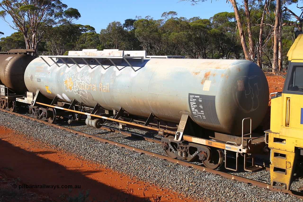 190109 1686
Binduli, empty fuel train 4445, RHTY type tank waggon RHTY 652, type leader of fourteen such waggons built by Industrial Engineering Qld in 1976 for Victorian Railways as TWX type crude benzene tank 56,000 litres. Recoded to VTHX in 1979. After a period of storage ended up in National Rail ownership for Alice Springs traffic, now Pacific National ownership.
Keywords: RHTY-type;RHTY652;Indeng-Qld;TWX-type;VTHX-type;