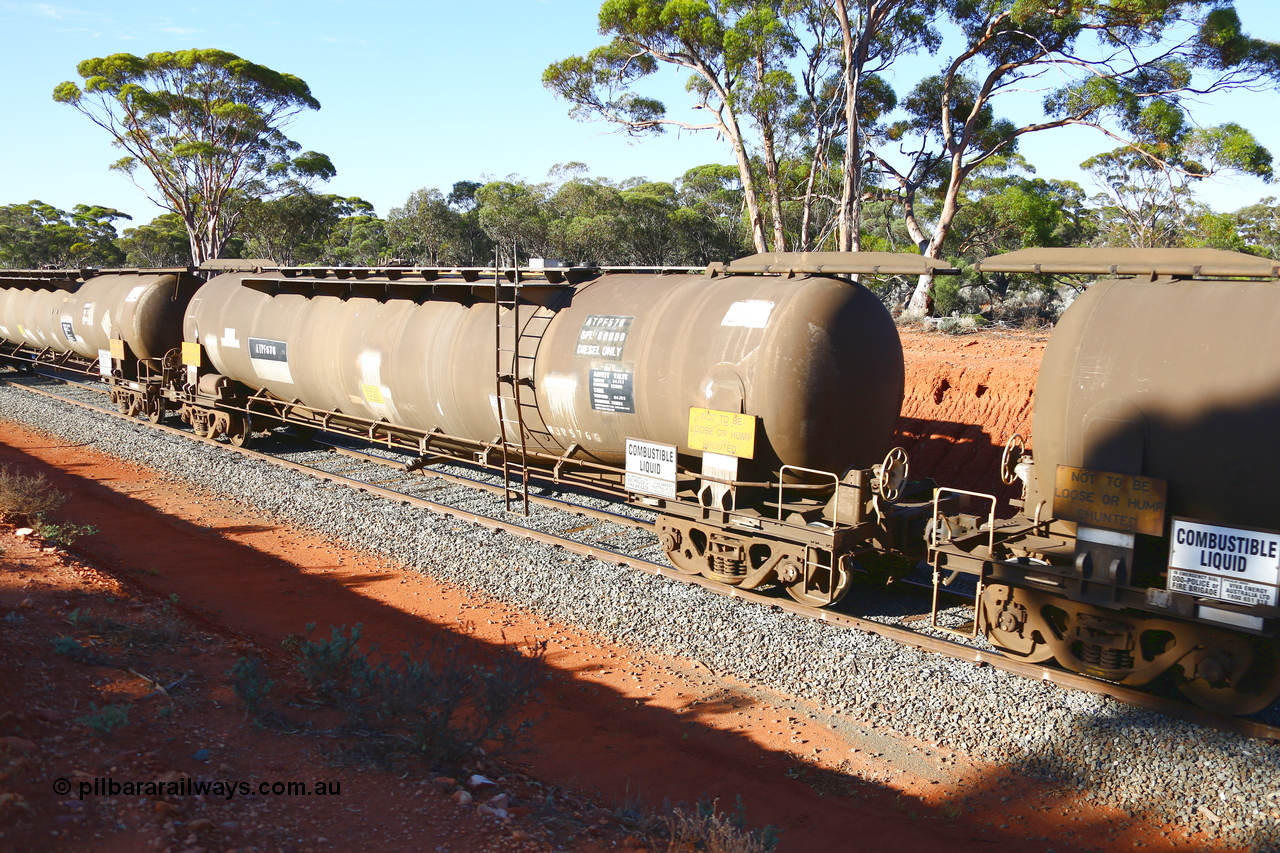 190109 1693
Binduli, empty fuel train 4445, ATPF type fuel tank waggon ATPF 576, built by WAGR Midland Workshops 1974 for Shell as WJP type, 80.66 kL one compartment one dome. Capacity now 80,000 litres, fitted with type F InterLock couplers and still with ladder. Under Viva Energy ownership.
Keywords: ATPF-type;ATPF576;WAGR-Midland-WS;WJP-type;