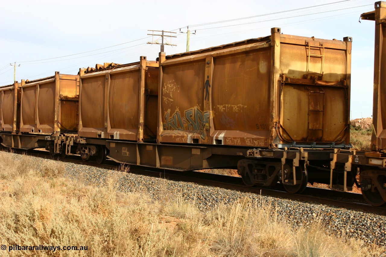 060531 4985
West Kalgoorlie, AQNY 32194 one of sixty two waggons built by Goninan WA in 1998 as WQN type for Murrin Murrin container traffic, with sulphur skips S131 and S162 with original door and sliding tarpaulins.
Keywords: AQNY-type;AQNY32194;Goninan-WA;WQN-type;