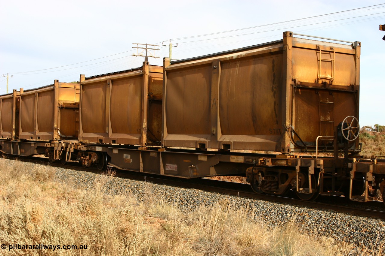 060531 4988
West Kalgoorlie, AQNY 32189 one of sixty two waggons built by Goninan WA in 1998 as WQN class for Murrin Murrin container traffic, with sulphur skips S74 and S7 with original door and sliding tarpaulins.
Keywords: AQNY-type;AQNY32189;Goninan-WA;WQN-type;
