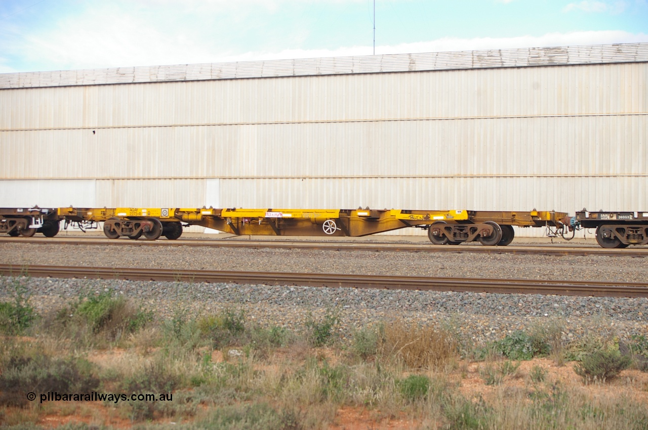 110709 7419 PD
West Kalgoorlie, AQAY 2273, this orphan waggon started life as a Comeng Vic built GOX type open waggon for Commonwealth Railways in 1970, then coded AOOX. Under AWR ownership is was reduced to this 3 TEU unit container skeletal waggon. Peter Donaghy image.
Keywords: Peter-D-Image;AQAY-type;AQAY2273;Comeng-Vic;GOX-type;AOOX-type;ROOX-type;ROKX-type;