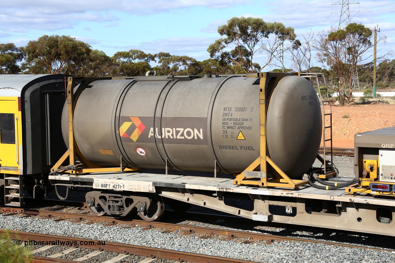 160525 4949
West Kalgoorlie, Aurizon intermodal train 2MP1. Inline fuelling waggon QQFY 4271 A end with 30' diesel fuel tanktainer from Nantong Tank Container Company, NTTU 330001, these tanks have a 30800 litre capacity.
Keywords: QQFY-type;QQFY4271;Perry-Engineering-SA;RMX-type;AQMX-type;AQMY-type;RQMY-type;