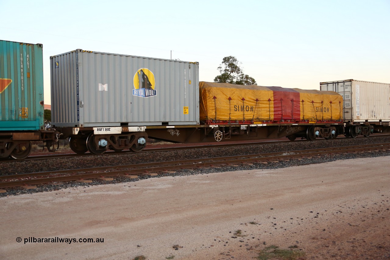 160523 2716
Parkeston, intermodal train 1PM5, RQFY 80 container waggon, built by Victorian Railways Bendigo Workshops in 1980 as a batch of seventy five VQFX type skeletal container waggons, recoded to VQFY c1985, then RQFY May 1994, May 1995 to RQFF, then 2CM bogies fitted in Aug 1995 and current code Feb 1996. Royal Wolf 20' box RWTU 969778 and a 40' FD type flatrack with Simon tarp.
Keywords: RQFY-type;RQFY80;Victorian-Railways-Bendigo-WS;VQFX-type;RQFF-type;
