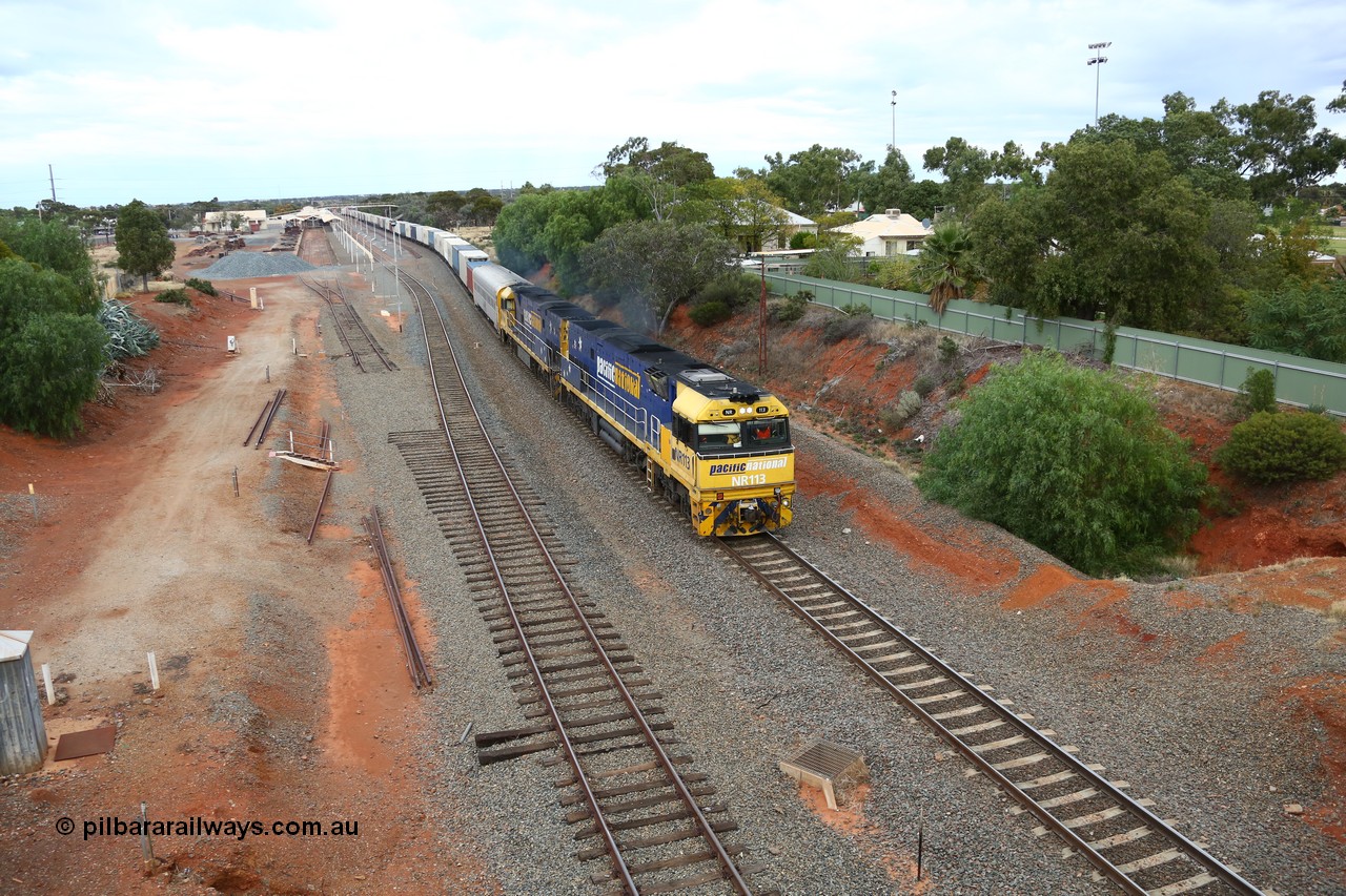 160524 3635
Kalgoorlie, priority service 2PS7 passes the station environs behind Goninan built GE model Cv40-9i NR class unit NR 113 serial 7250-09/97-312, originally built for National Rail now in current owner Pacific National livery, the timber sleepers still in situ for the points to the dock road.
Keywords: NR-class;NR113;Goninan;GE;Cv40-9i;7250-09/97-312;