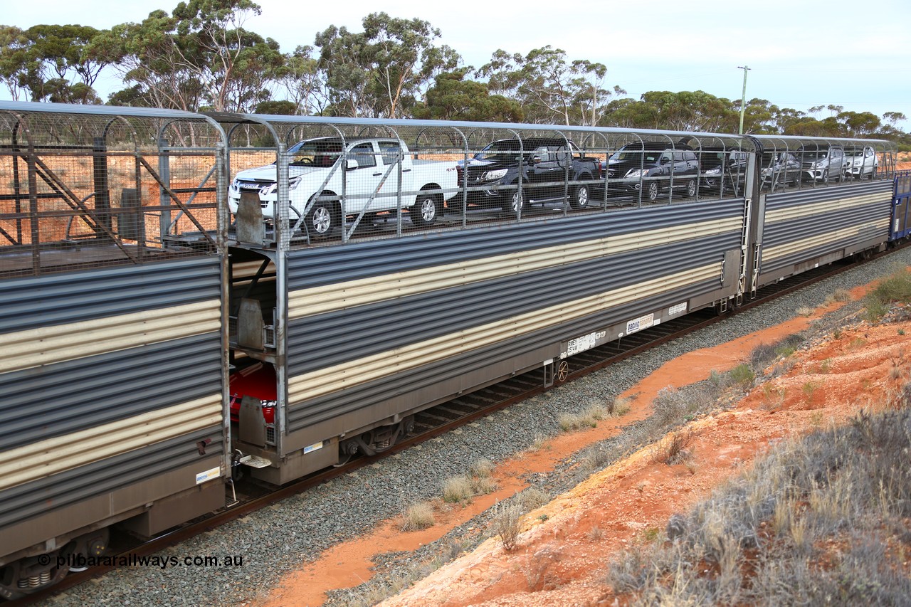 160524 3743
West Kalgoorlie, 2PM6 intermodal train, articulated 2-pack triple deck automobile waggon RMEY 2574, converted by Cheeseman Engineering in 2004 from a former 1972 vintage Comeng Victoria built GNX automobile waggon 2574, later coded ANMX and another ANMX waggon.
Keywords: RMEY-type;RMEY2574;Cheeseman-Engineering-SA;Comeng-Vic;GNX-type;AMNX-type;