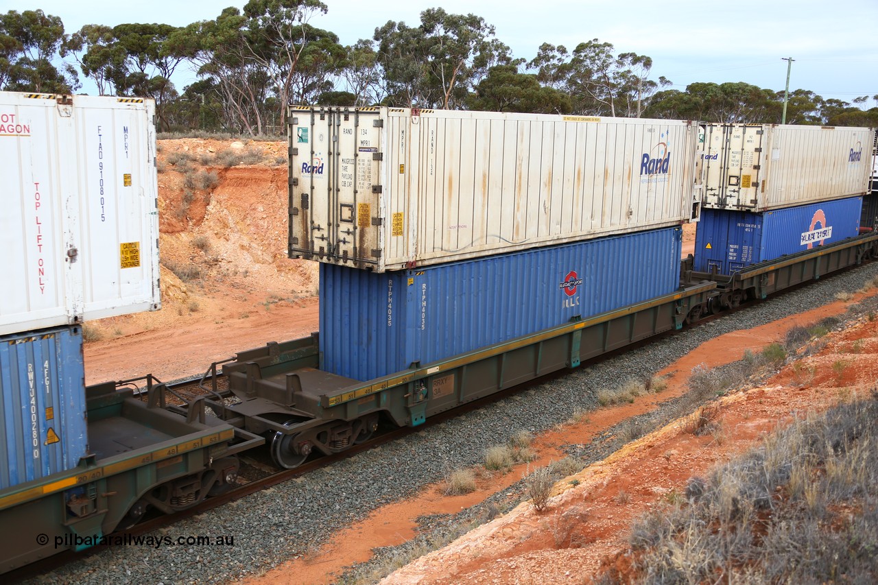 160524 3748
West Kalgoorlie, 2PM6 intermodal train, RRXY 3 platform 3 of 5-pack well waggon set, one of eleven built by Bradken Qld in 2002 for Toll from a Williams-Worley design with a 46' RAND Refrigerated Logistics reefer RAND 134 on top of a Railroad Transport Bulk 40' box RTPH 4035.
Keywords: RRXY-type;RRXY3;Williams-Worley;Bradken-Rail-Qld;