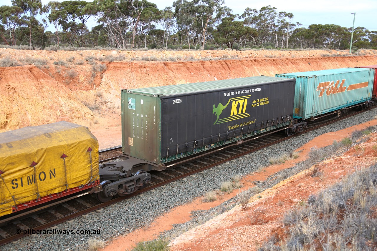 160524 3752
West Kalgoorlie, 2PM6 intermodal train, RRQY 8313 platform 4 of 5-pack articulated skel waggon, one of forty one sets built by Qiqihar Rollingstock Works China in 2006 loaded with a 40' KTI curtainsider KTI 402.
Keywords: RRQY-type;RRQY8313;Qiqihar-Rollingstock-Works-China;