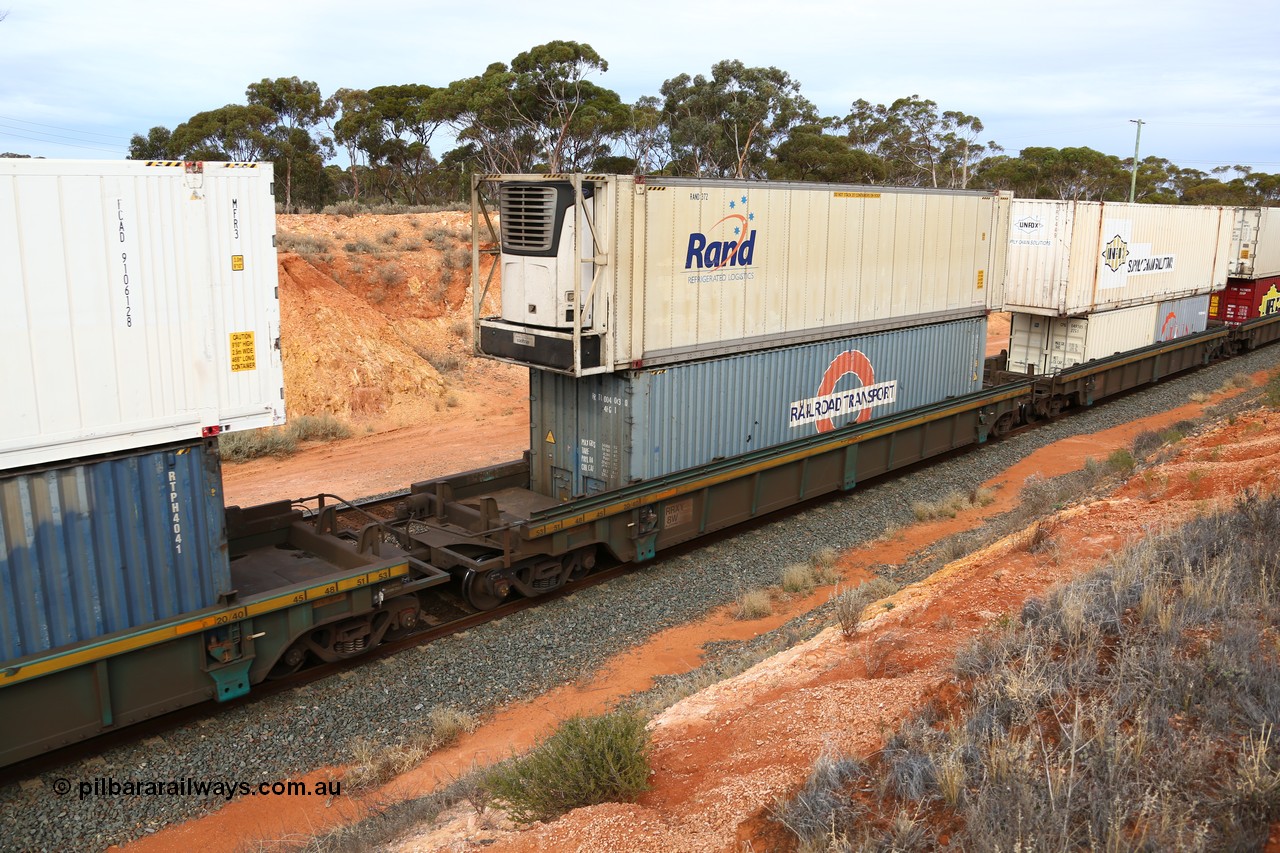 160524 3802
West Kalgoorlie, 2PM6 intermodal train, RRXY 8 platform 3 of 5-pack well waggon set, one of eleven built by Bradken Qld in 2002 for Toll from a Williams-Worley design with a 40' Railroad Transport box RRTU 004063 in the well and a RAND Refrigerated Logistics 46' MFR3 type reefer RAND 372 on top.
Keywords: RRXY-type;RRXY8;Williams-Worley;Bradken-Rail-Qld;