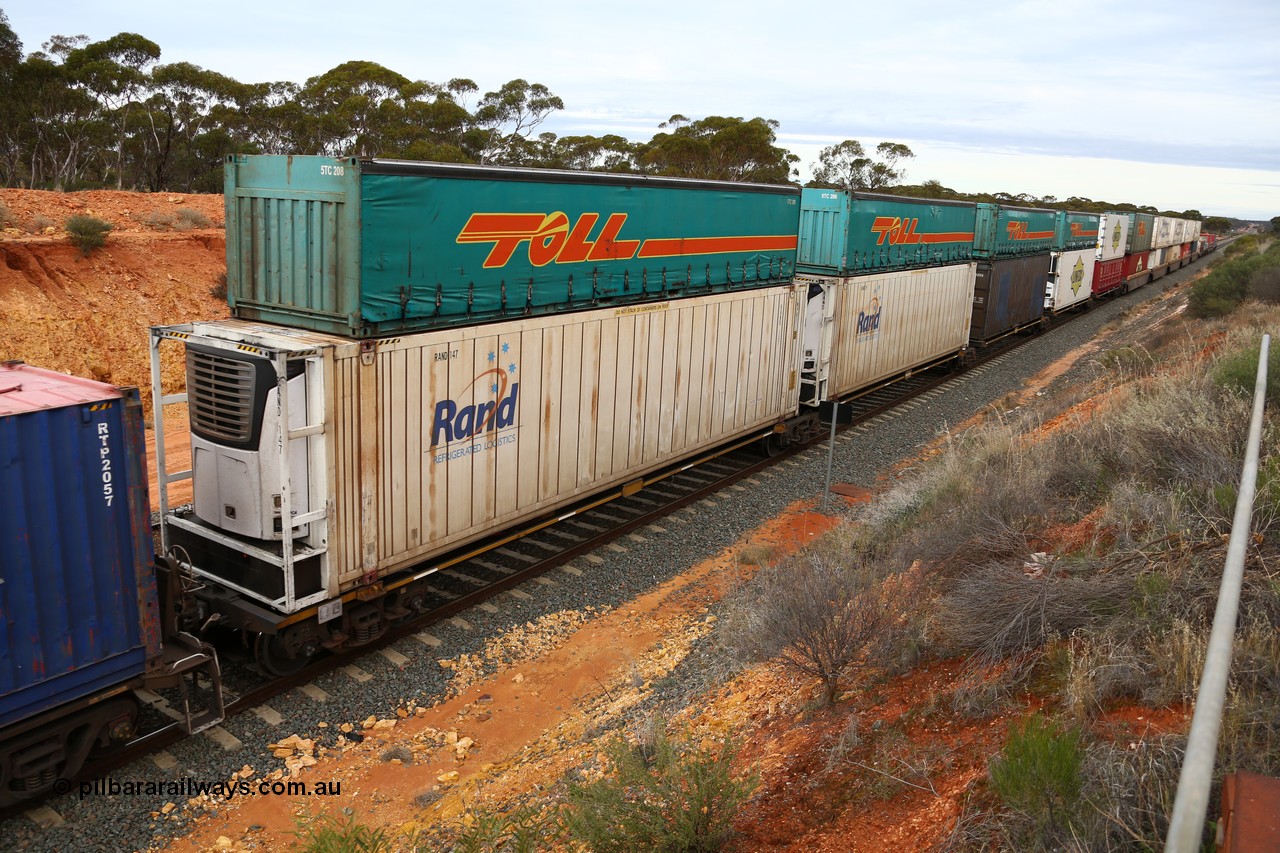 160526 5246
West Kalgoorlie, 4PM6 intermodal train, RRQY 8518 5-pack articulated skel waggon set one of a batch of thirty four built by Qiqihar Rollingstock Works China in 2012 for Pacific National, with mainly 46' reefers double stacked with 40' half height curtainsiders.
Keywords: RRQY-type;RRQY8518;Qiqihar-Rollingstock-Works-China;