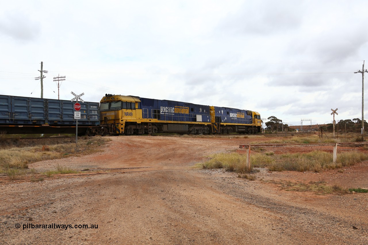 160526 5255
Parkeston, 3MP7 priority service train runs upgrade around the curve bound for Kalgoorlie and Perth behind Goninan built GE model Cv40-9i NR class units NR 82 serial 7250-03/97-284 and NR 49 serial 7250-08/97-251. Trailing view with gauge check in the distance.
Keywords: NR-class;NR49;Goninan;GE;Cv40-9i;7250-08/97-251;